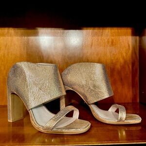 Leather slide heels.